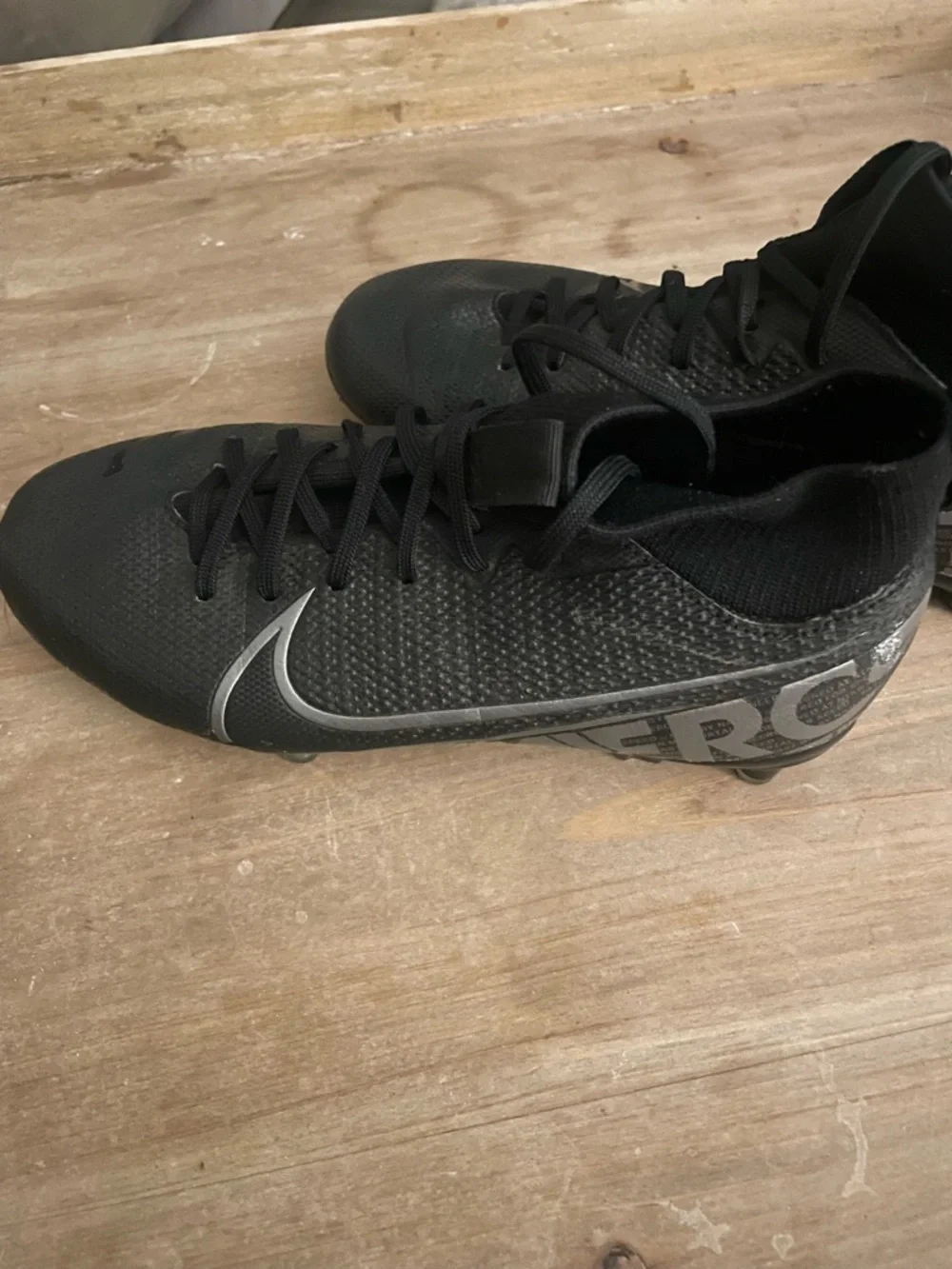 Nike Kids Black Sneakers with Silver Swoosh